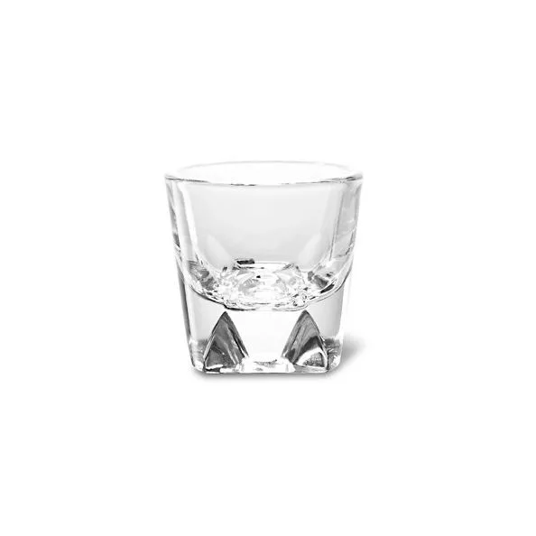A clear, empty notNeutral VERO Espresso Glass with a thick, angular base and straight sides, centered on a white background; holds up to 3 oz. © 2025 1st-line.com