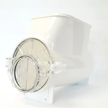 A white and transparent plastic kitchen attachment with a round clear lid and latch, part of the SPM Conversion Kit for GT Touch to GT LAB Configuration, shown on a plain white background. © 2025 1st-line.com