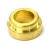 The Lelit 2200012 Spring Holder for Steam/Hot Water Valve is a small, gold-colored metal bushing with a wide outer rim and central hole, shown against a white background. © 2025 1st-line.com