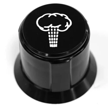 The Bezzera BE..35 STEAM HANDLE is a black control knob featuring a white mushroom cloud graphic resembling an explosion on its top surface. © 2025 1st-line.com