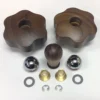 The Lelit PLA2200 Wood Steam/Hot Water Knob Kit for PL62 Mara models is arranged neatly on a white background, showing two dark wood flower knobs, a small wood knob, two metal spheres, brass cones, washers, and C-clips. © 2025 1st-line.com