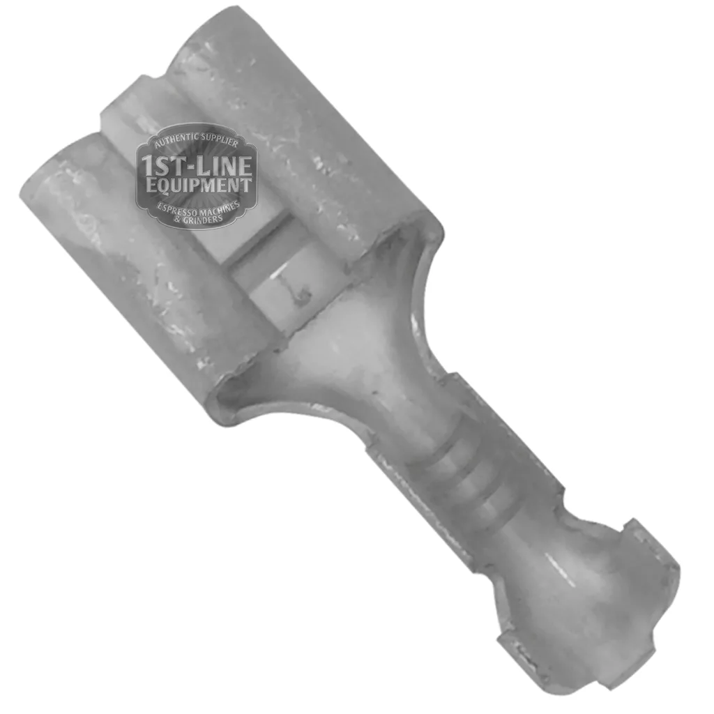 A close-up black and white image of the Female Faston Terminal 6.3X0.8mm - Tinned Brass by 1st-line shows its textured surface and tinned brass interior, with the 1st-Line Equipment logo faintly visible in the top left corner. © 2025 1st-line.com