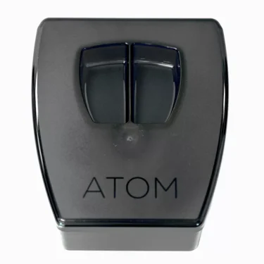 A black, rectangular Eureka 2580.1000TFN Tinted Bean Hopper Assembly with two dark buttons on top, viewed from above on a white background—an elegant design reminiscent of Eurekas iconic style. © 2025 1st-line.com