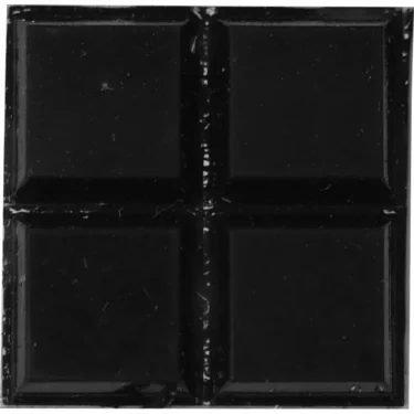 A close-up of a dark chocolate square with a glossy finish, divided into four parts, lies beside Eureka 6040.0063KIT Plastic Base Feet, creating a striking and unique arrangement. © 2025 1st-line.com
