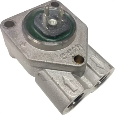 A close-up of the Elektra 06050014 Flowmeter shows its metal body labeled GICAR, two inlet/outlet ports, top electrical connectors, and flow direction arrows. © 2025 1st-line.com