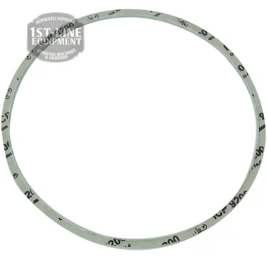 A thin, circular gray Cimbali ALIMENTARY BOILER GASKET with black markings is displayed on a white background, featuring the 1st Line Equipment logo in the upper left corner—ideal for replacing your Cimbali boiler gasket. © 2025 1st-line.com