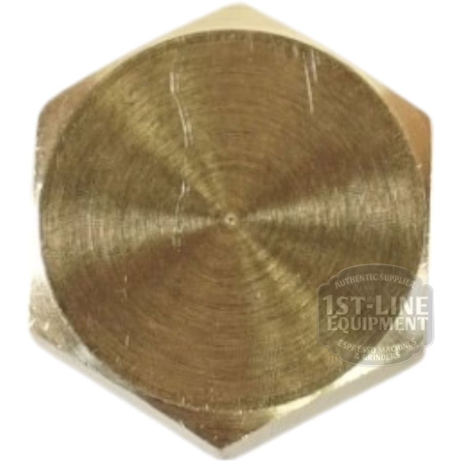 Close-up of the 1st-Line 1/4 Cap/Plug, featuring a brass hexagonal shape and flat, circular face with visible machining marks. The semi-transparent 1st-Line Equipment logo is in the lower right corner. © 2025 1st-line.com