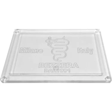 The Bezzera 5370012 Back Clear Logo Plate features engraved words Milano Italy, BEZZERA, DAL 1901, and a stylized serpent wrapped around a winged staff. © 2025 1st-line.com