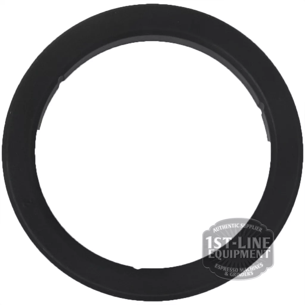 The I.4731 portafilter gasket for Ascaso Dream/PID 2019 is a black, circular gasket with a smooth surface and small inner notches, shown on a white background with a semi-transparent 1st-Line Equipment watermark in the lower right. © 2025 1st-line.com