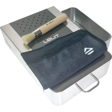 The Lelit PLA360M Knock Box Drawer set includes a wooden-handled cleaning brush and a black Lelit microfiber cloth, all crafted for premium stainless steel espresso accessory organization. © 2025 1st-line.com