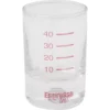 The V..855 ESPRESSO TEST GLASS is a clear measuring cup with red markings at 10, 20, 30, and 40 ml and Espresso Test labeled at the bottom. The empty glass is shown against a white background. © 2025 1st-line.com