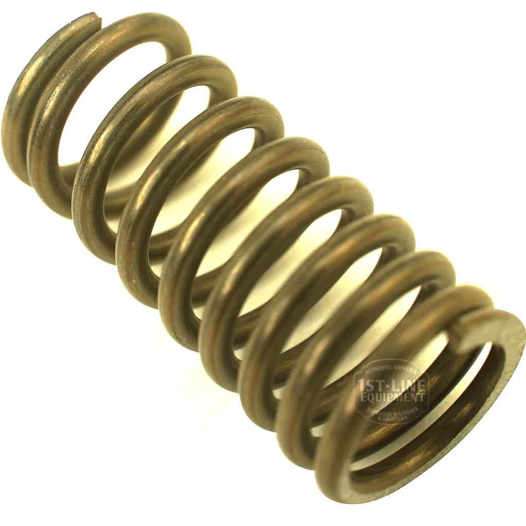 A close-up of the Faema E61 Spring Expansion Valve, featuring a tightly wound metal coil with a bronze finish and helical shape, ideal for the espresso machine, set against a white background. © 2025 1st-line.com