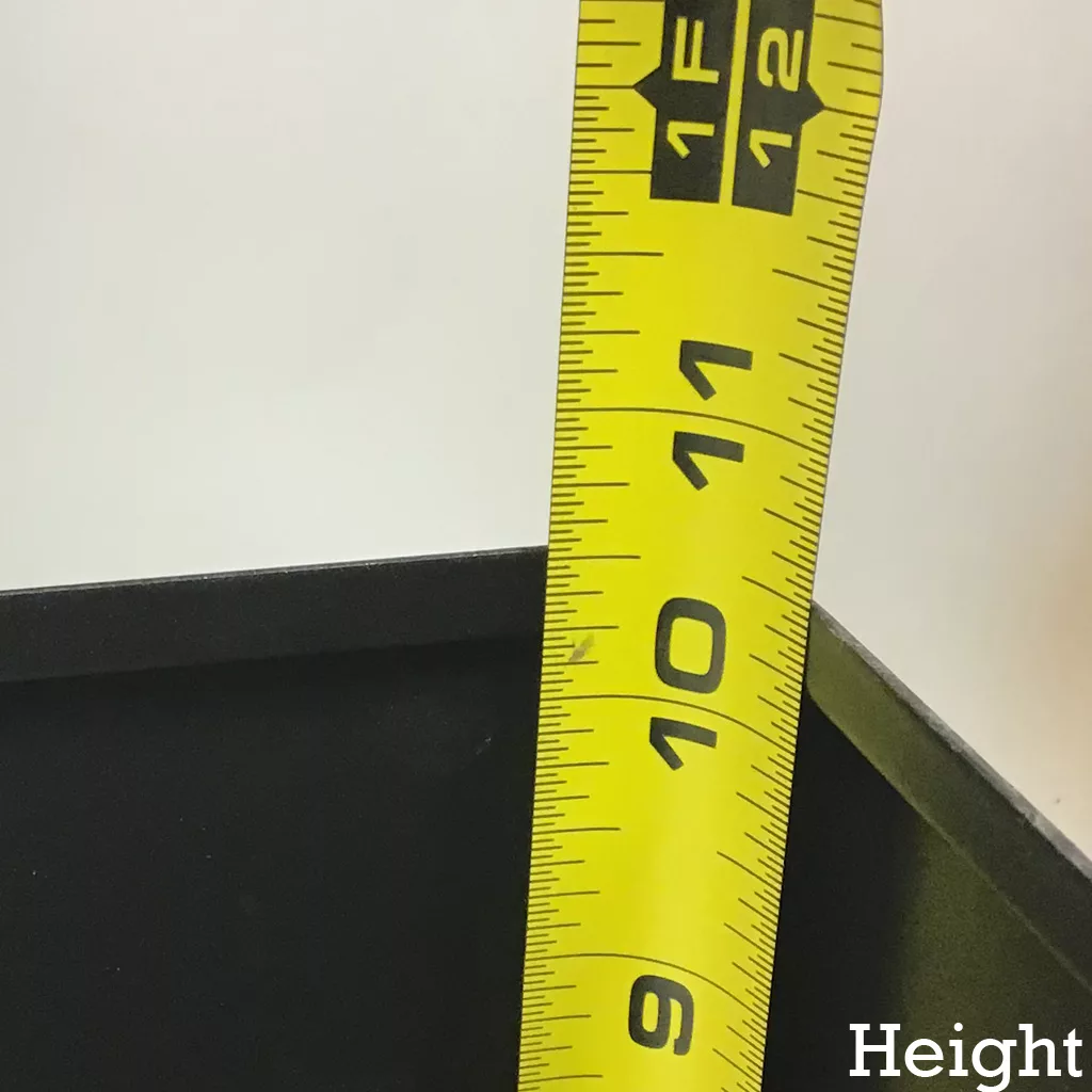 A yellow measuring tape stands vertically beside the Olympia Anthracite Body Panel, showing a height just over 11 inches. Height is displayed in white text at the bottom right corner. © 2025 1st-line.com