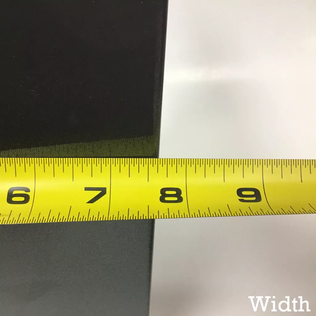 A yellow measuring tape stretches across the Olympia Anthracite Body Panel, showing a width of about 8 inches. Width appears in the bottom right corner. © 2025 1st-line.com
