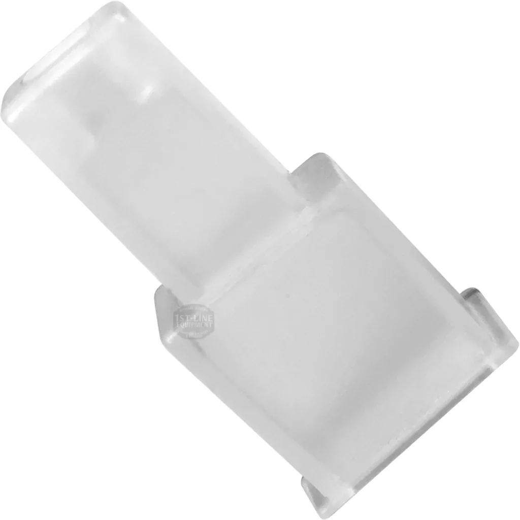 V..560 Male Faxton Terminal Protector shown: a clear plastic RJ45 Ethernet port dust cover with an angled design on a white background. © 2025 1st-line.com