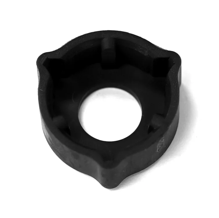 A black, circular plastic part for the Lelit 8600019 Automatic Tank Floating Detector, featuring a central hole and three rounded protrusions, is pictured on a white background. © 2025 1st-line.com