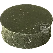 The CA.237 OUTLET GASKET is a round, flat, dark puck-shaped water softener filter with a slightly rough texture, faint watermark logo on the side, and an integrated outlet gasket for secure fitting. © 2025 1st-line.com
