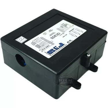 The Pro. El. Ind. A1500095 Brain Unit - SDE3D F13 NBV6 is a black electronic control box with specs and a diagram on its label, mounting tabs, and cable entry points—designed for automation systems. © 2025 1st-line.com