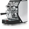 The VBM Domobar Super Analogic HX Espresso Machine w/ Flow Control, in sleek black and silver, features levers, pressure gauges, and a drip tray, all displayed against a white background. © 2025 1st-line.com