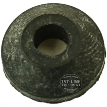 Close-up of a worn F..302 RUBBER CLOSING GASKET 12x4x4 mm, round and black with a central hole, on a white background. The objects texture and a partially visible 1st-Line Equipment logo can be seen. © 2025 1st-line.com