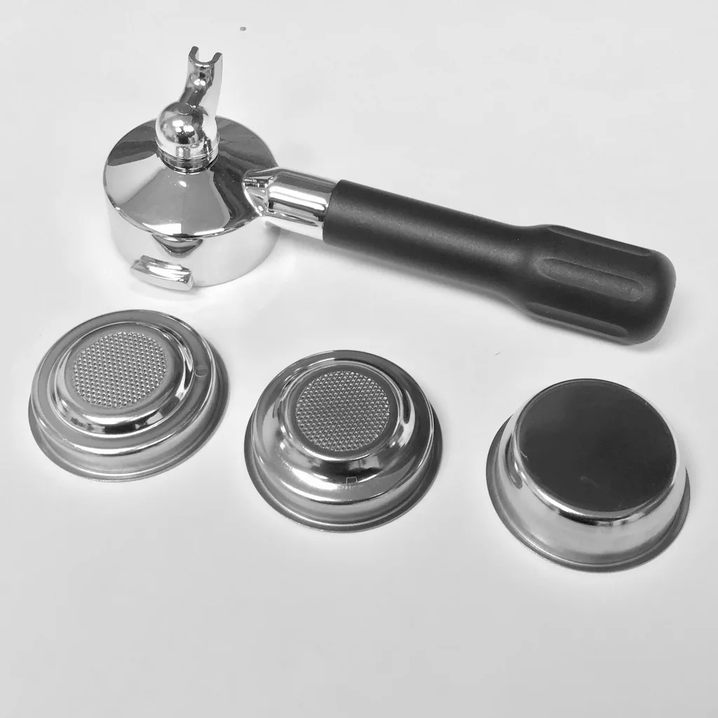 The Lelit PLA571S 57 mm Single Spout Black Handle Portafilter Kit is displayed beside three metal filter baskets with mesh and solid bottoms, all arranged side by side on a white surface. © 2025 1st-line.com