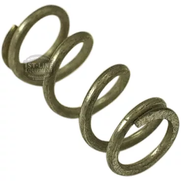 Close-up of the F.1267 SPRING, a small steel component with a textured surface, positioned diagonally on a white background to showcase its sturdy construction and quality finish. © 2025 1st-line.com