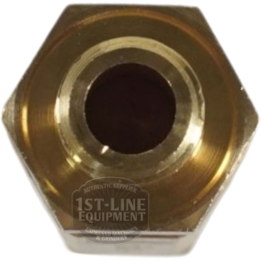 A close-up of a brass hexagonal nut for the Lelit 9700043 Safety Valve - 5.5 Bar 1/8G, shows a central threaded hole and the 1st-Line Equipment watermark partially visible at the bottom. © 2025 1st-line.com