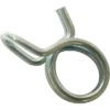 A close-up of the Lelit 9400046 Spring Clamp, a silver metal clamp with a circular center and two protruding tabs, is shown against a white background. © 2025 1st-line.com