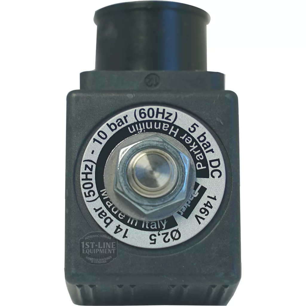 Close-up of a F.1289 1/8X1/8 9W 230V PARKER SOLENOID coil, labeled “Parker Hannifin,” showing specs and “Made in Italy,” with a hex nut and circular metal part centered in the image. © 2025 1st-line.com