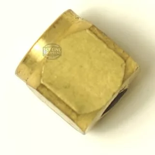 A brass hexagonal nut with a slightly worn surface, viewed at an angle on a plain white background, pairs well with an F..233 SQUARE BRASS BOLT for secure fastening in many applications. © 2025 1st-line.com