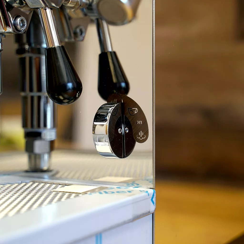 Shiny metal knob with on/off labels on the SIDEWALK SALE - VBM Domobar Super HX Tank Espresso Machine DEMO (E114), handles and metallic parts visible. Perfect for coffee lovers—grab it at our Sidewalk Sale!. © 2025 1st-line.com