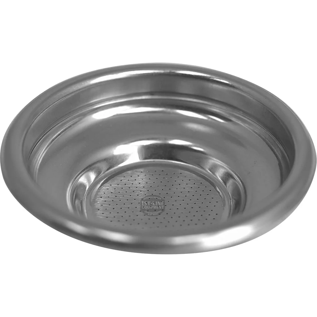 The Rancilio 7 GRAM 1 CUP FILTER is a round stainless steel plate with raised edges and a perforated base, ideal for serving or straining in kitchens and designed to fit Rancilio espresso machines as a 1 cup filter. © 2025 1st-line.com