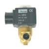 The V.1459 24VDC 9W PARKER SOLENOID, featuring a black ZB12 coil (24VDC, 9W, 100% ED, IP65), is mounted on a brass body and shown against a white background. © 2025 1st-line.com