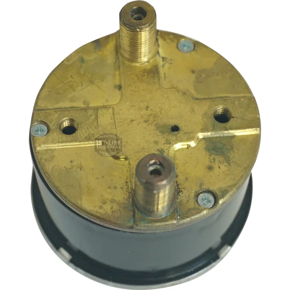 The WEGA W10790 DOUBLE MANOMETER features a round brass housing with three threaded ports, four top screws, and is mounted on a black base, shown from above. © 2025 1st-line.com