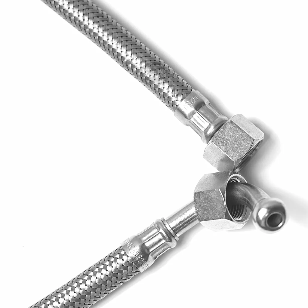 Two V..455 1.5M Stainless Steel Flexible Hoses with braided exteriors and metal hex fittings are arranged diagonally on a white background, one fitting facing upward and the other outward. © 2025 1st-line.com