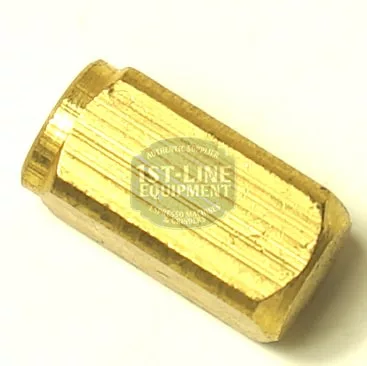 A close-up of a shiny, textured brass hexagonal coupling nut, similar to those used with the F..229 LARGE VALVE GUIDE - 12.3mm, lying on a light background. © 2025 1st-line.com