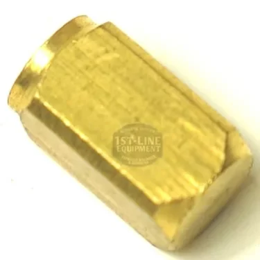 A close-up of the F..211 UPPER SHORT VALVE GUIDE, a small hexagonal brass nozzle with a threaded hole, typically used as part of valve assemblies in espresso machines. © 2025 1st-line.com