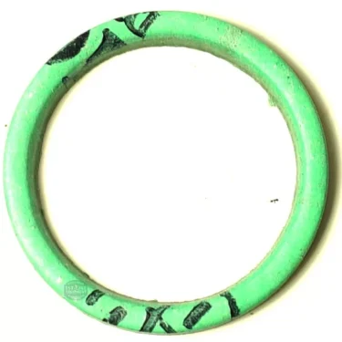 A green circular bangle with black markings, resembling an SM.180 ALIMENTARY FLAT GASKET 34x26.5x2 mm, is displayed on a white background. © 2025 1st-line.com