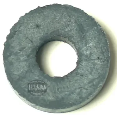 A round, gray metal washer with a rough finish and large central hole (15x5.5x3.5 mm) is shown on a white background. Perfect as an SP...3 STEAM RUBBER GASKET 15x5.5x3.5 mm for secure fittings. © 2025 1st-line.com