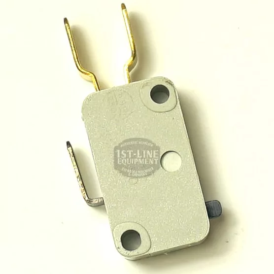 A small rectangular SP..32 250V 6A GROUP MICRO microswitch features two gold terminals, one silver terminal marked SP..32, a raised black side button, gray casing with the 1st Line Equipment logo, and is rated for 250V. © 2025 1st-line.com