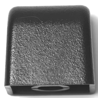 Close-up view of a DISCONTINUED F.1363 110V-9W PARKER SOLENOID ZB09, black textured rectangular plastic with a small circular opening at the bottom center, shown against a white background. © 2025 1st-line.com