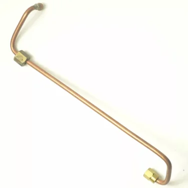 The Bezzera 5162184.01LL HX Suppression Valve Pipe is a copper pipe with brass fittings on both ends, bent at an angle, shown on a white background; perfect for use with an HX Suppression Valve. © 2025 1st-line.com