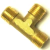 A brass T-shaped pipe fitting with three threaded male ends, for connecting pipes in plumbing or gas systems, can be securely installed using an F.1020 STAINLESS STEEL SCREW M5x14. © 2025 1st-line.com
