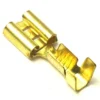 A close-up of a gold-colored V..559 MALE FAXTON TERMINAL crimp connector, commonly used for electrical wiring and connections. © 2025 1st-line.com