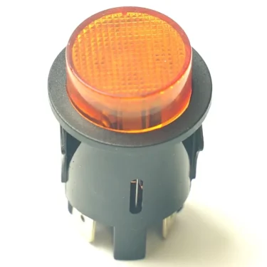 A close-up of a round orange indicator light with a textured lens in black plastic housing, commonly used in electrical panels or machinery featuring the V.1651 3 WAYS (TYPE 7W) M&M SOLENOID CORE. © 2025 1st-line.com