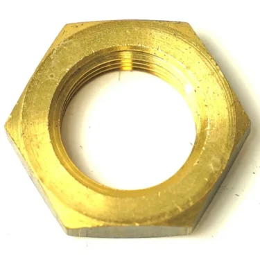 A close-up of the SM..96 STEAM WAND FIXING NUT, a brass hexagonal nut with internal threading for secure attachment in steam wand assemblies, shown against a white background. © 2025 1st-line.com