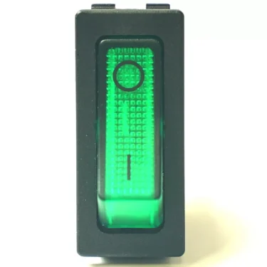 A close-up of the V.1479 3 FASTON GREEN SWITCH, 30x11mm, 250V 10A, shows its rectangular green rocker in a black frame set to on, against a white background. © 2025 1st-line.com