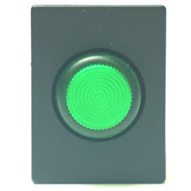 A close-up of the V.4277 GREEN LIGHT PUSH-BUTTON, a rectangular black panel with a centered, circular green button featuring a textured surface with concentric rings. © 2025 1st-line.com