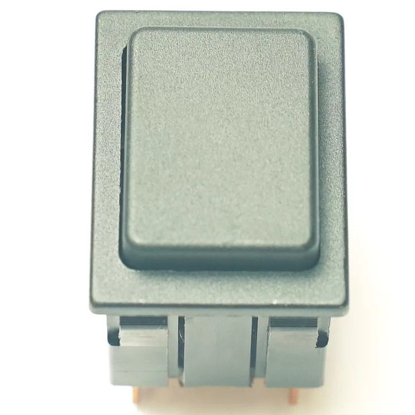 A close-up of the V.4289 BLACK PUSH SWITCH shows its rectangular, flat-surfaced design for panel mounting, with metal pins at the bottom for electrical connections, similar to a gray rocker switch. © 2025 1st-line.com