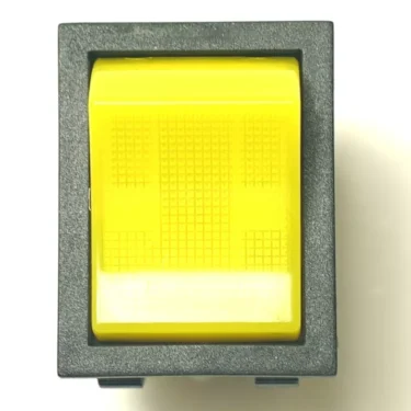 A close-up of the V.4327 30x11 YELLOW PILOT rocker switch, featuring a textured rectangular yellow surface in a black frame, set against a white background. © 2025 1st-line.com